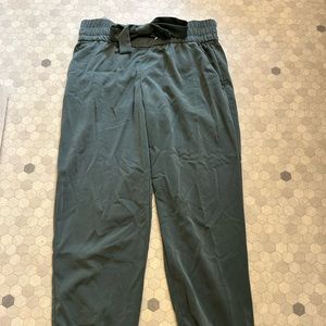 Dynamite Sasha jogger in dark green. Size medium.